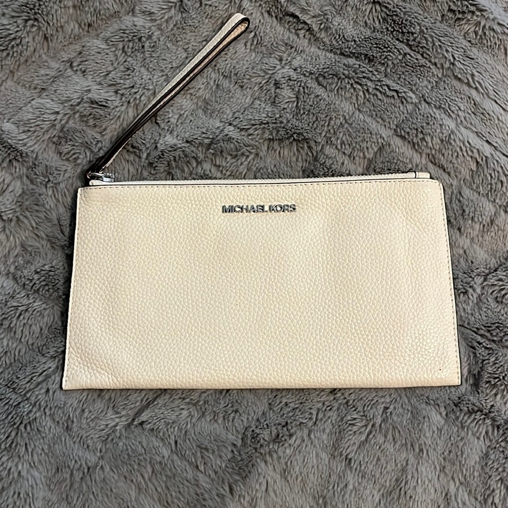 Soft cream pebbles leather wristlet. Like new
